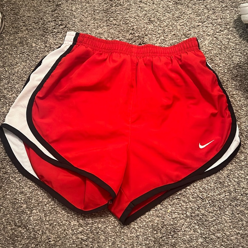 Older red Nike shorts.